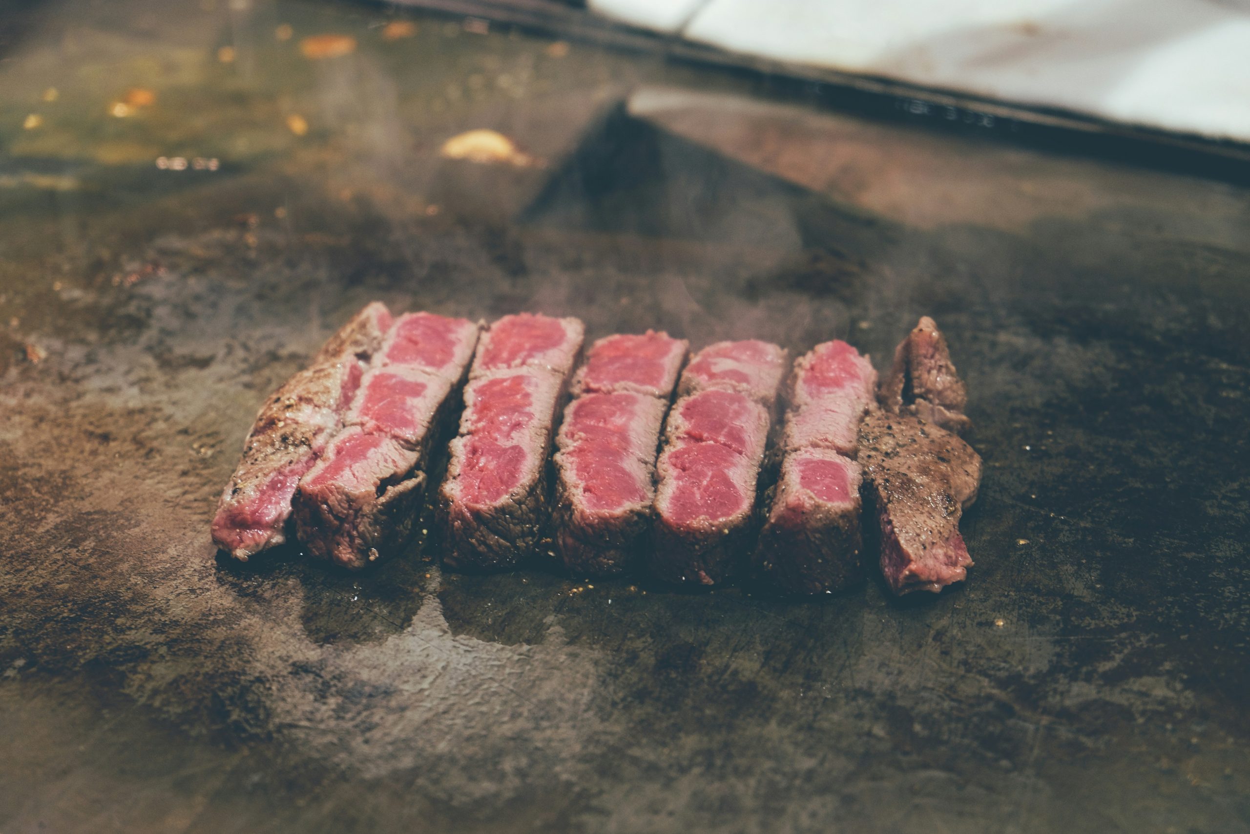 seared, pink steak. Photo by Note Thanun on Unsplash.com